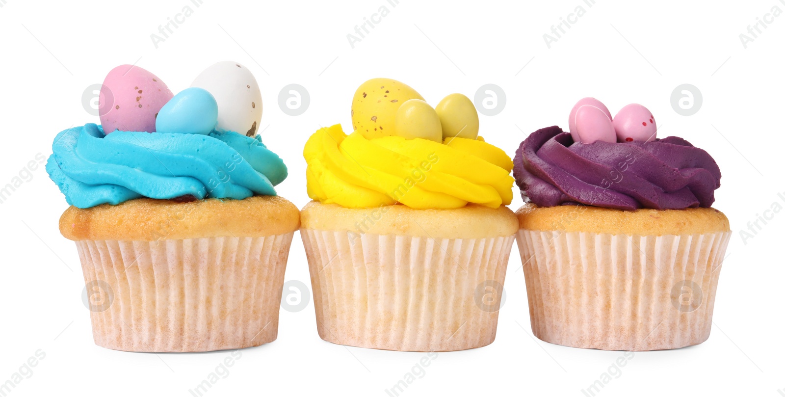 Photo of Tasty decorated Easter cupcakes isolated on white