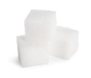 Photo of Three refined sugar cubes isolated on white