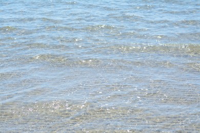 Beautiful sea water surface with waves on sunny day