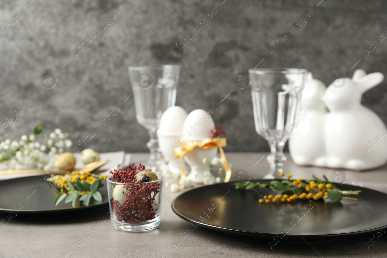 Photo of Festive Easter table setting with beautiful floral decor