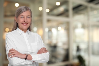 Image of Lawyer, consultant, business owner. Confident woman smiling indoors, space for text