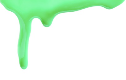 Photo of Green nail polish flowing on white background