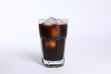 Photo of Refreshing iced coffee in glass isolated on white