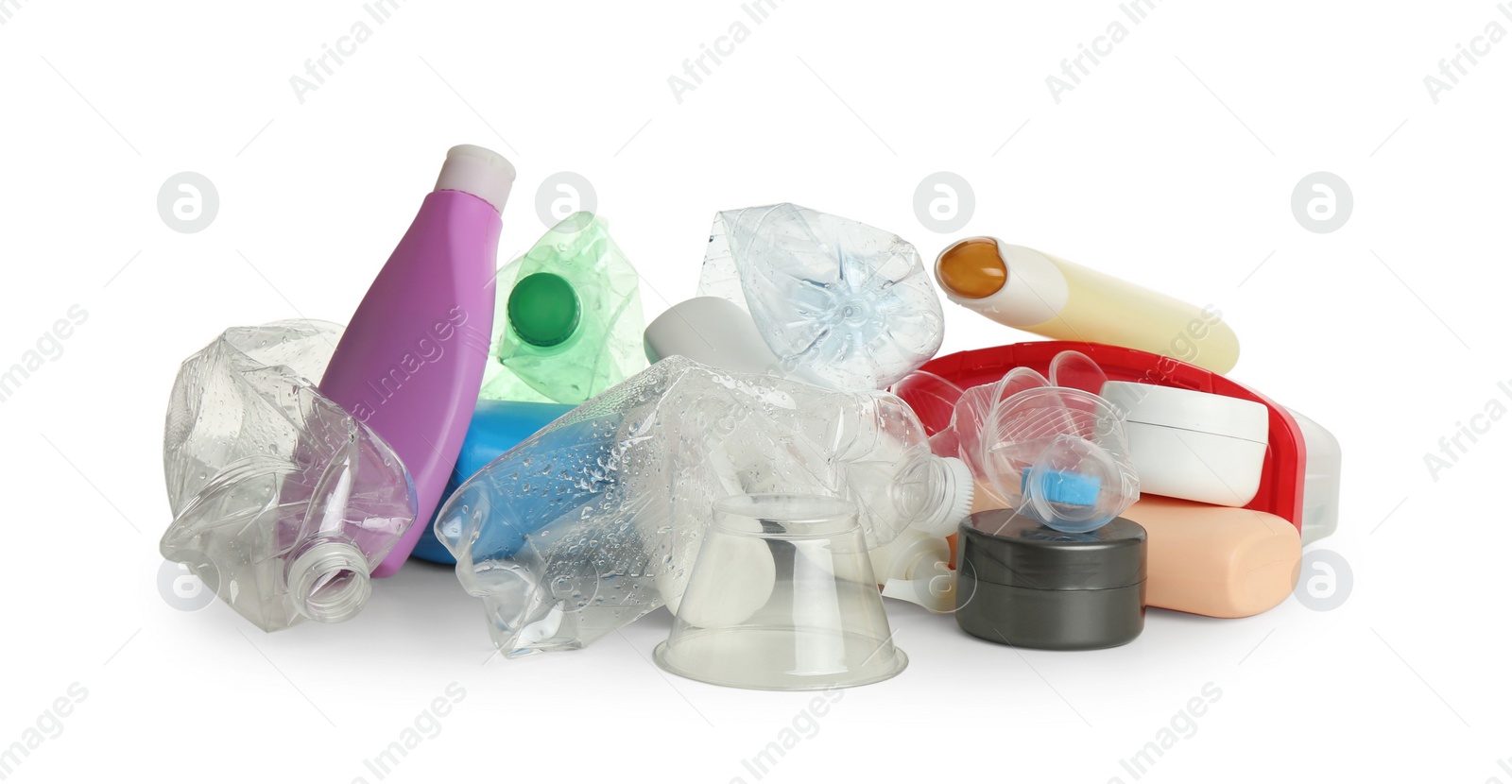 Photo of Pile of plastic garbage on white background