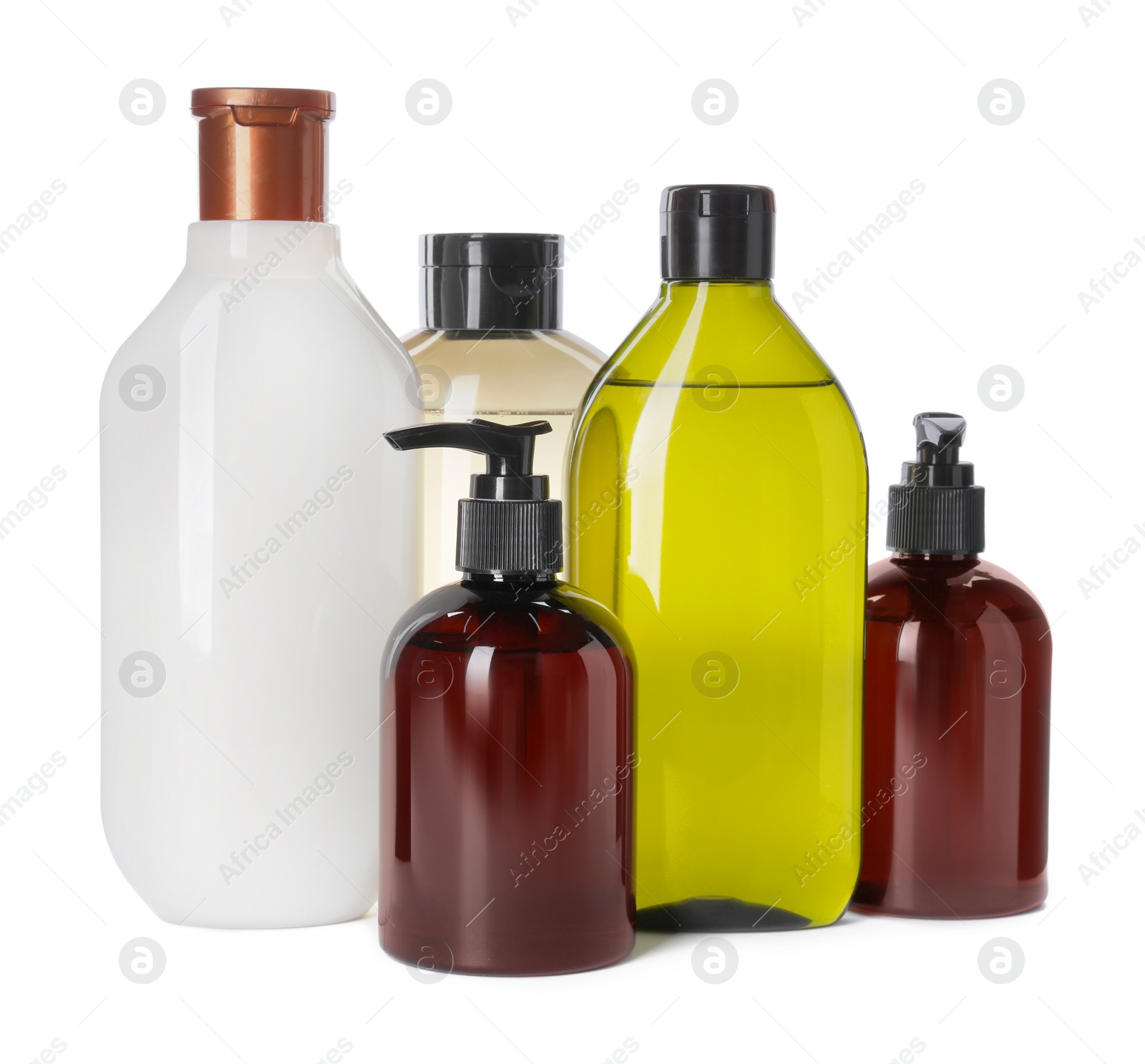 Photo of Different bottles of shampoo on white background