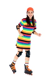 Young woman in bright dress with inline roller skates on white background