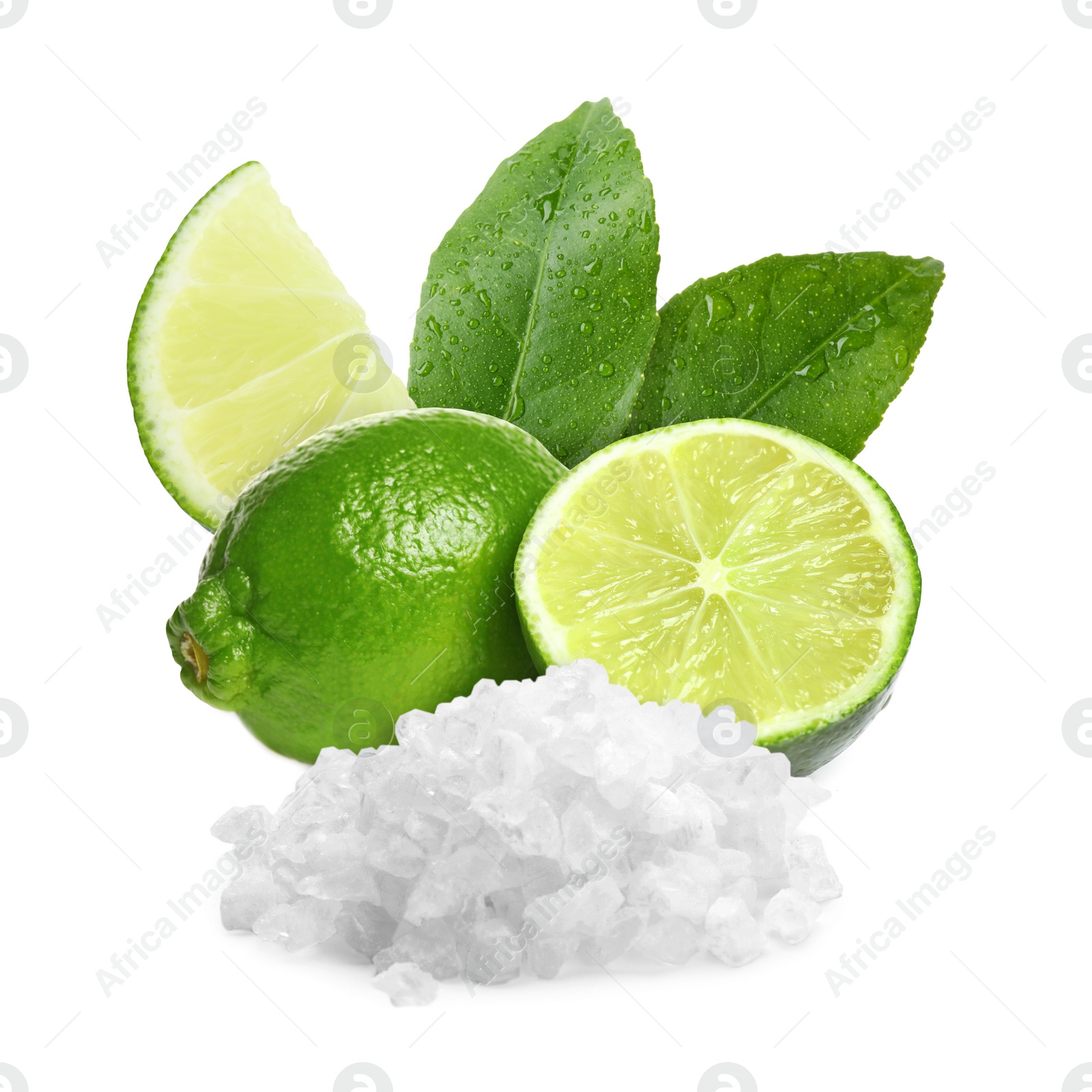 Image of Limes and salt isolated on white. Margarita cocktail ingredients