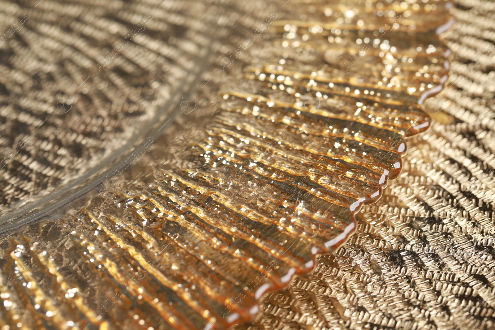 Photo of Beautiful golden textured surface as background, closeup