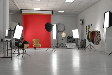 Interior of modern photo studio with professional equipment