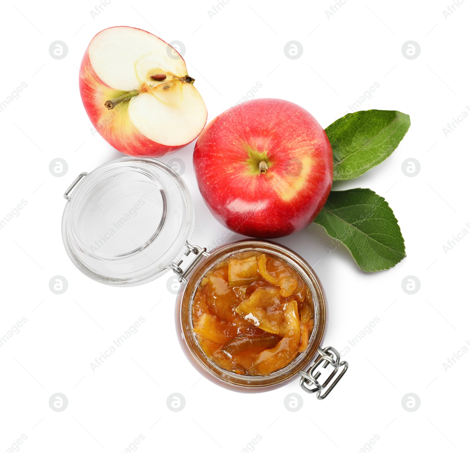 Photo of Tasty apple jam in glass jar and fresh fruits on white background, top view