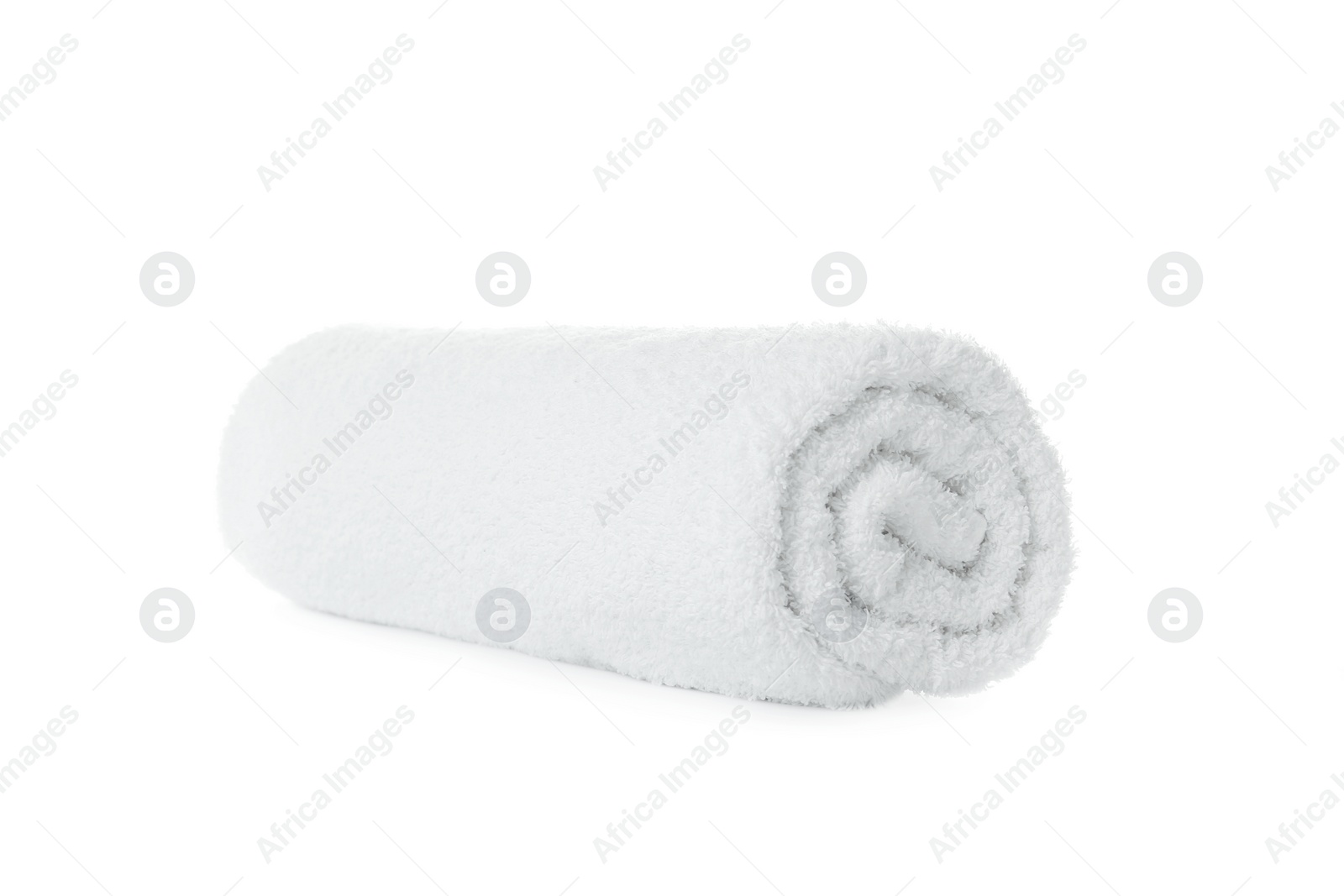 Photo of Rolled soft terry towel on white background