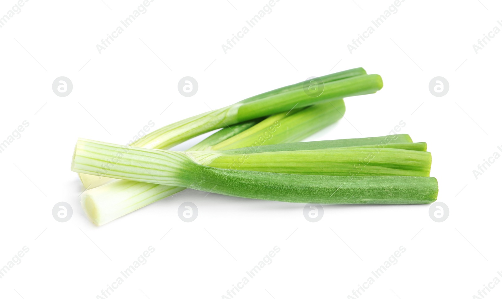 Photo of Fresh green spring onions isolated on white