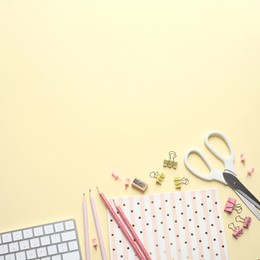 Image of Flat lay composition with scissors and office supplies on light background. Space for text