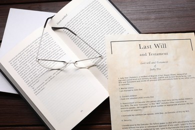 Photo of Last Will and Testament, books and glasses on wooden table, top view
