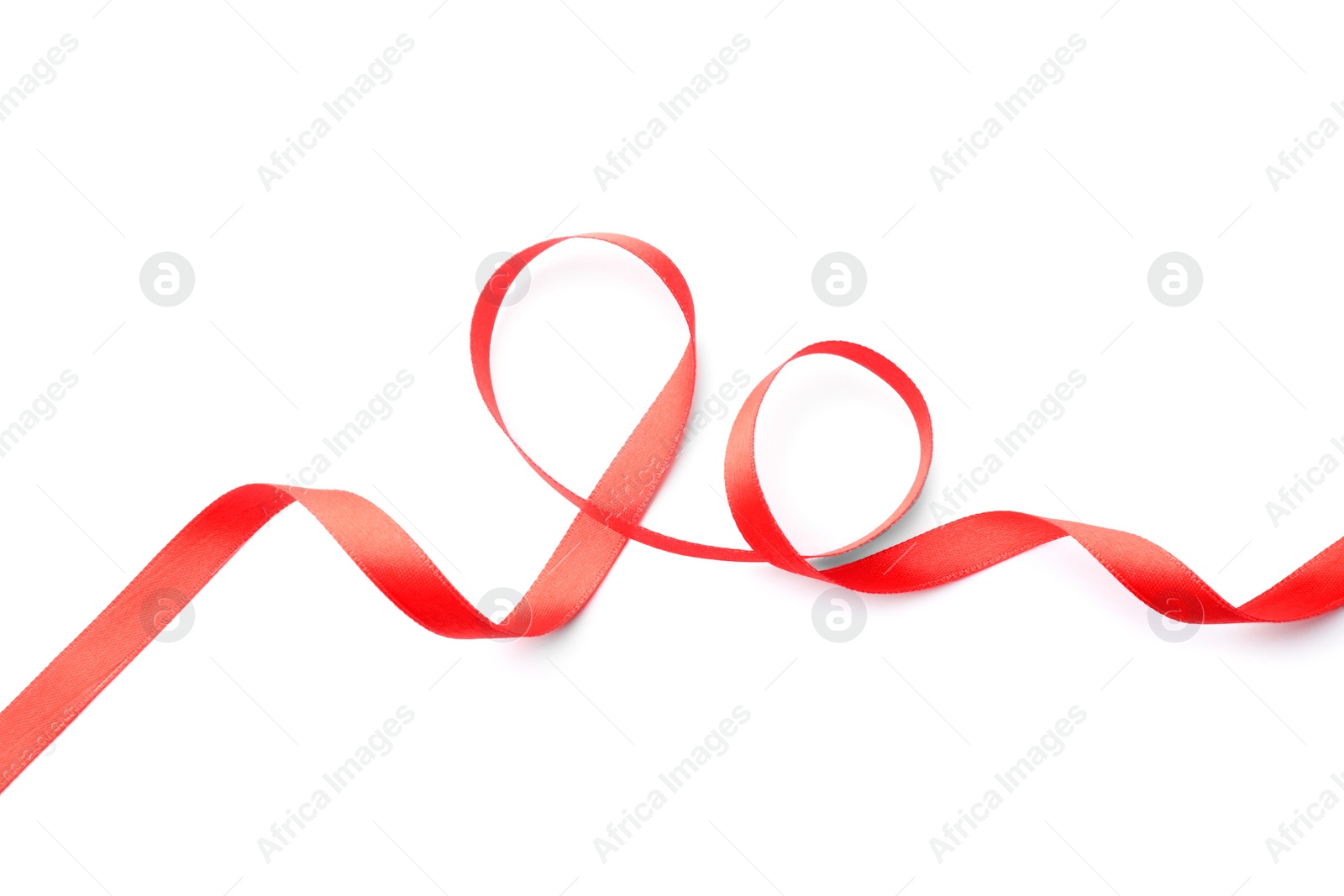 Photo of Simple red ribbon on white background, top view. Festive decoration