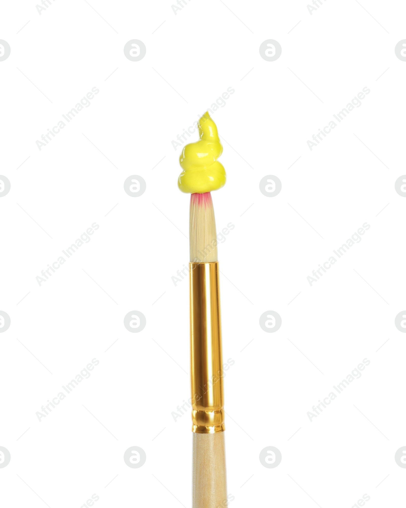 Photo of Brush with yellow paint on white background