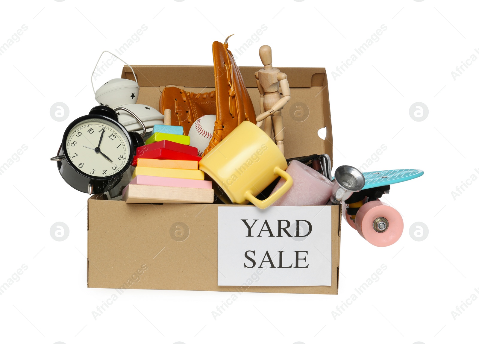 Photo of Sign Yard Sale written on box with different stuff isolated on white