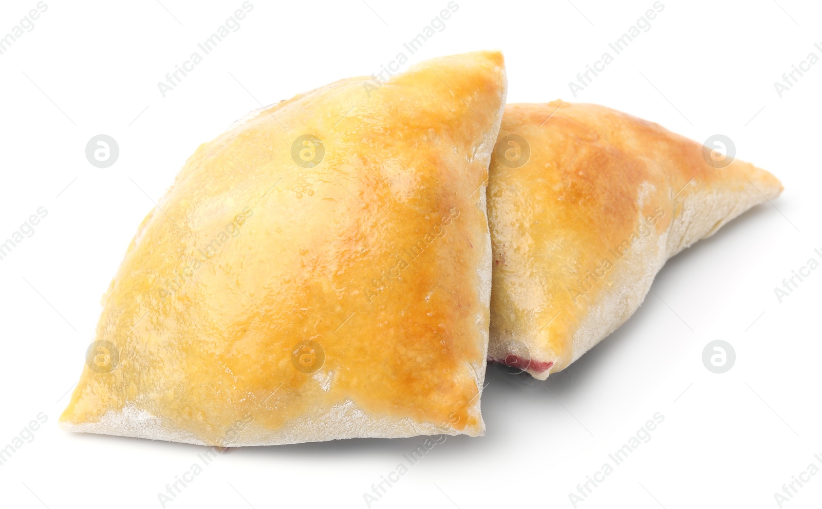 Photo of Delicious samosas isolated on white. Homemade pastry