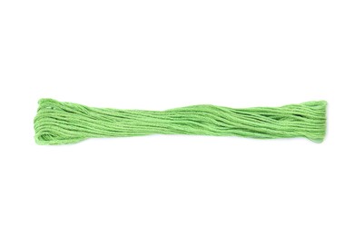 Light green embroidery thread on white background