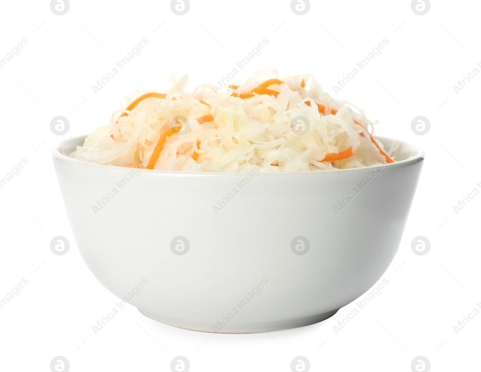 Photo of Bowl of tasty fermented cabbage isolated on white