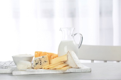 Different dairy products on table