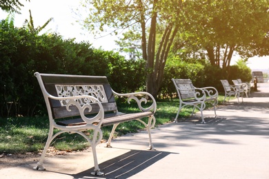 Photo of Beautiful view of green park with benches