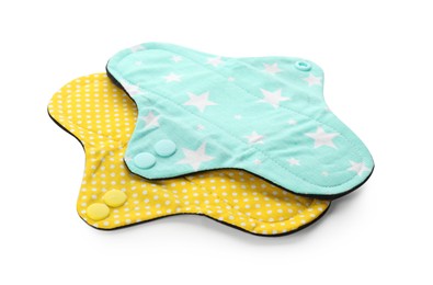 Cloth menstrual pads on white background. Reusable female hygiene product