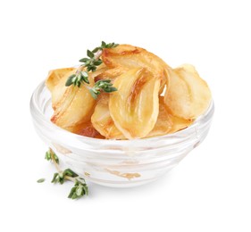 Photo of Fried garlic cloves and thyme in bowl isolated on white