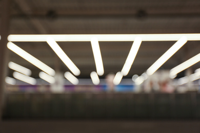 Photo of Blurred view of shopping mall interior. Bokeh effect