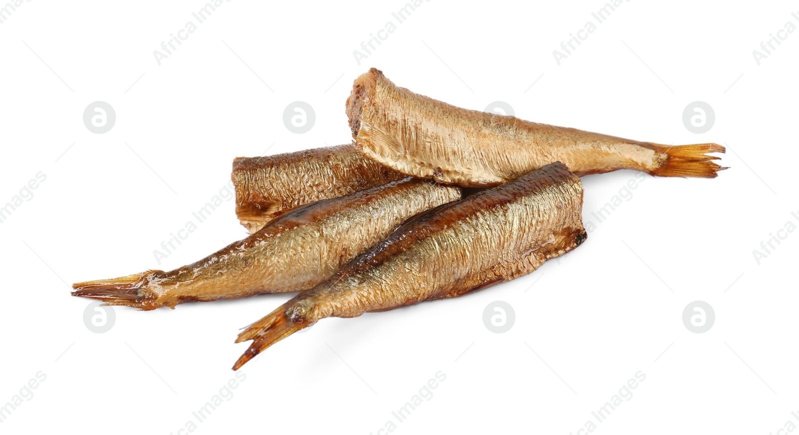 Photo of Many tasty smoked sprats isolated on white