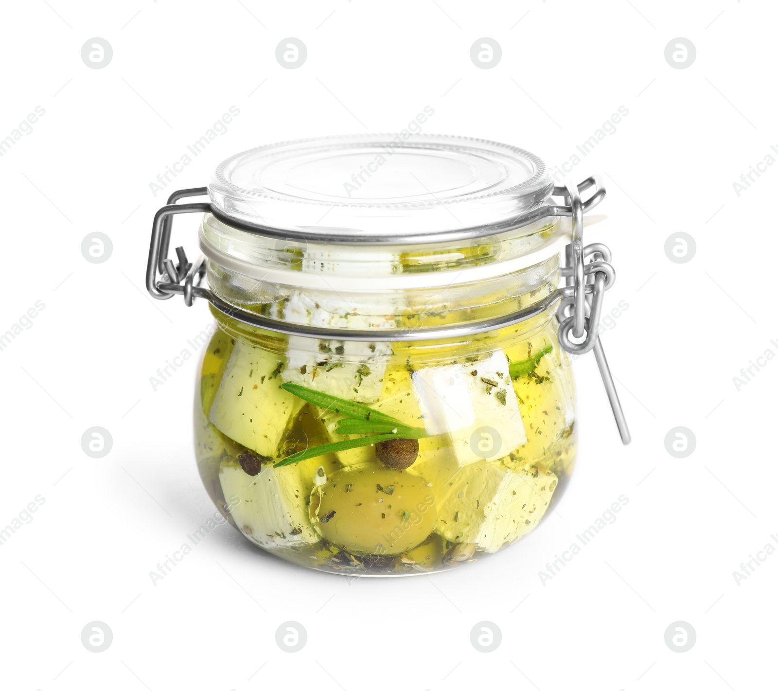 Photo of Closed jar with feta cheese marinated in oil on white background. Pickled food