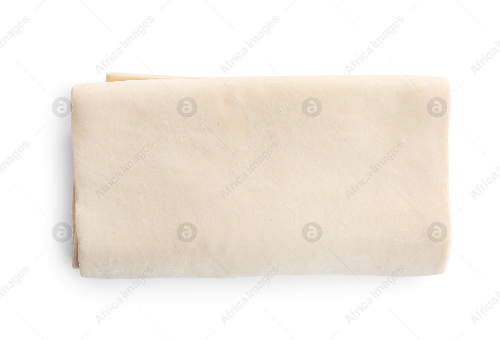 Photo of Fresh dough on white background, top view. Puff pastry