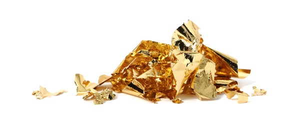 Photo of Pile of edible gold leaf on white background