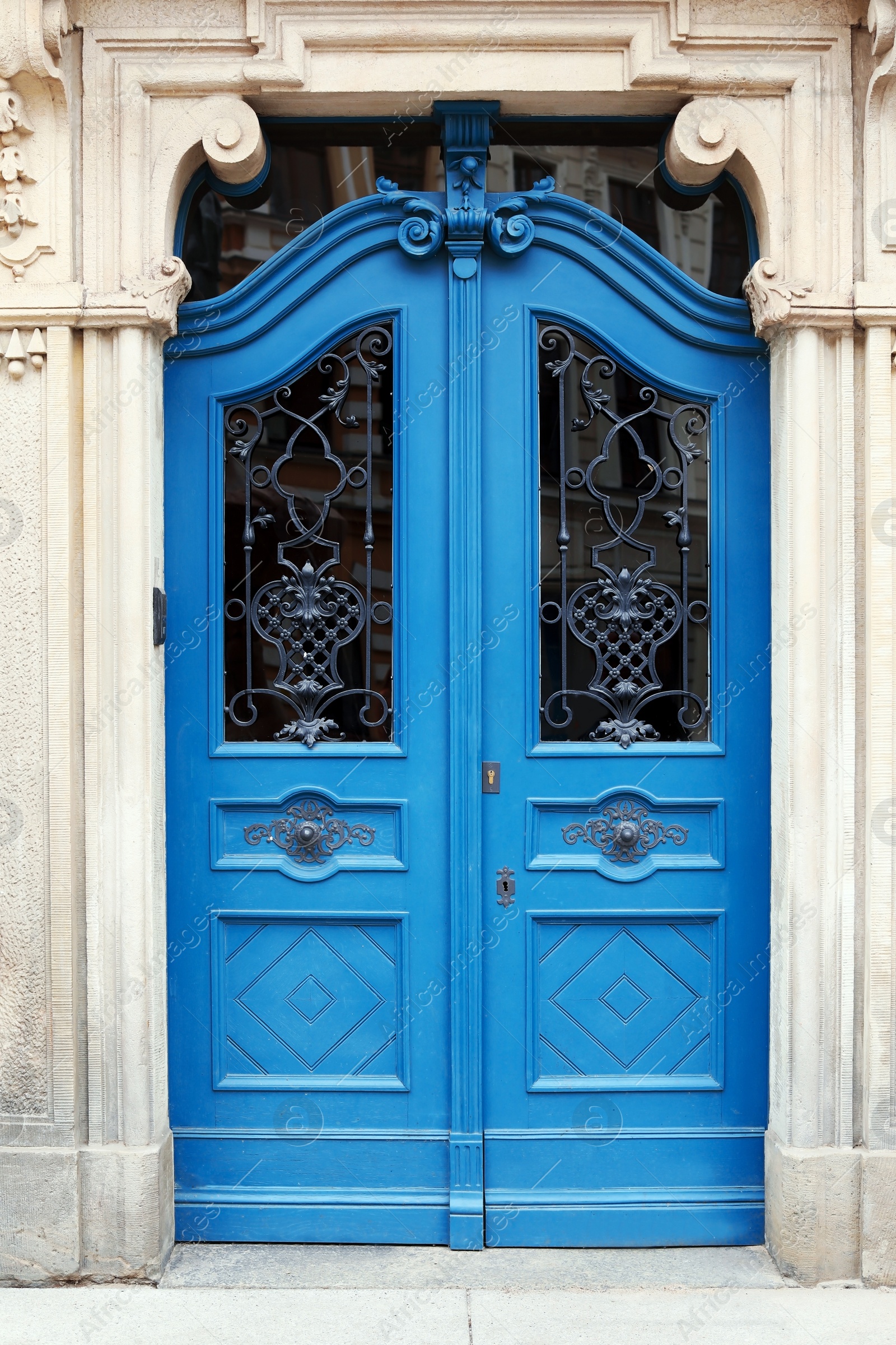 Photo of Ornate entrance of old building. Beautiful design