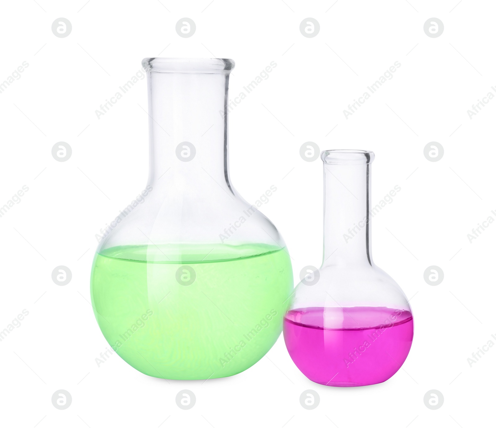 Photo of Laboratory glassware with colorful liquids on white background