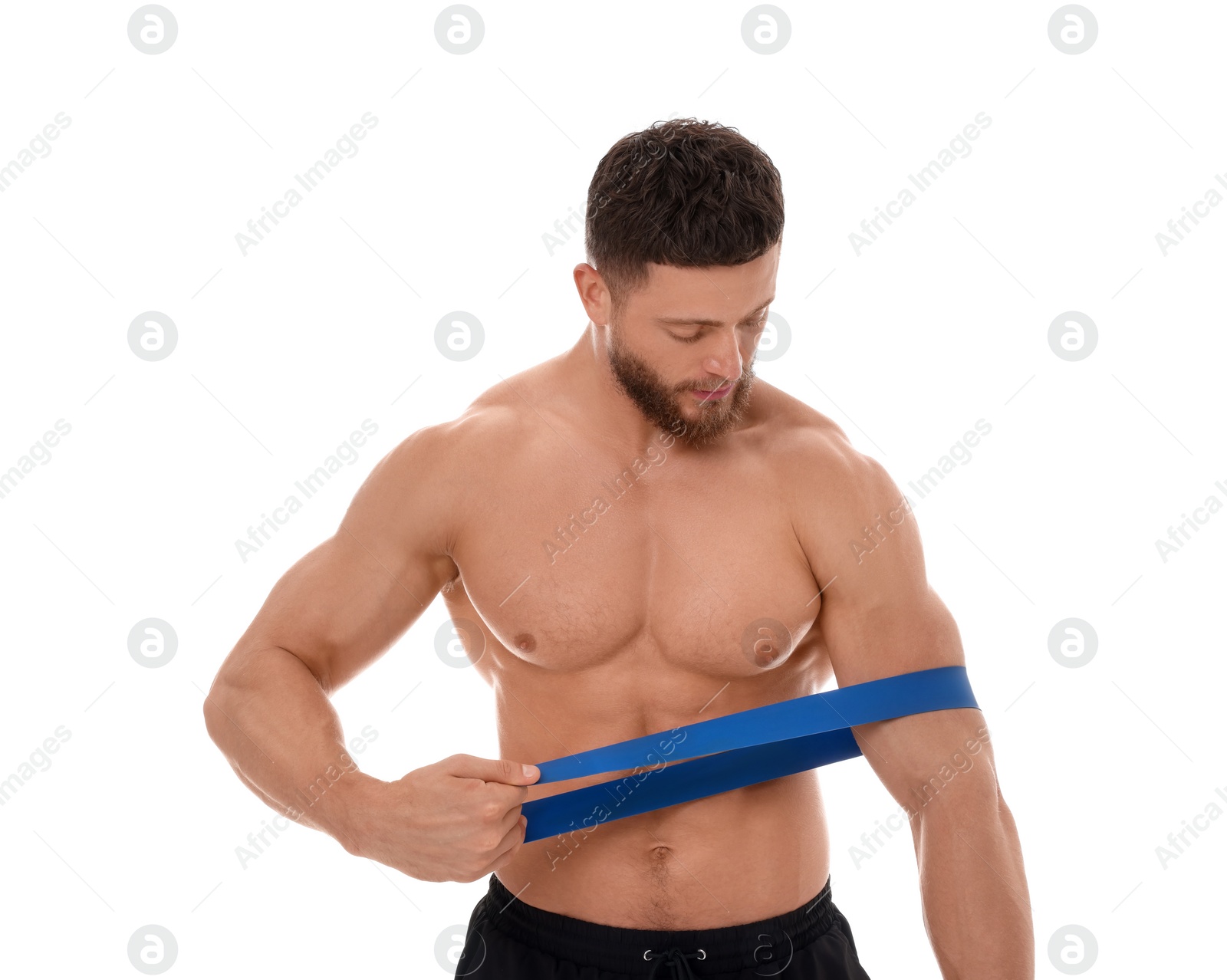 Photo of Young man exercising with elastic resistance band on white background