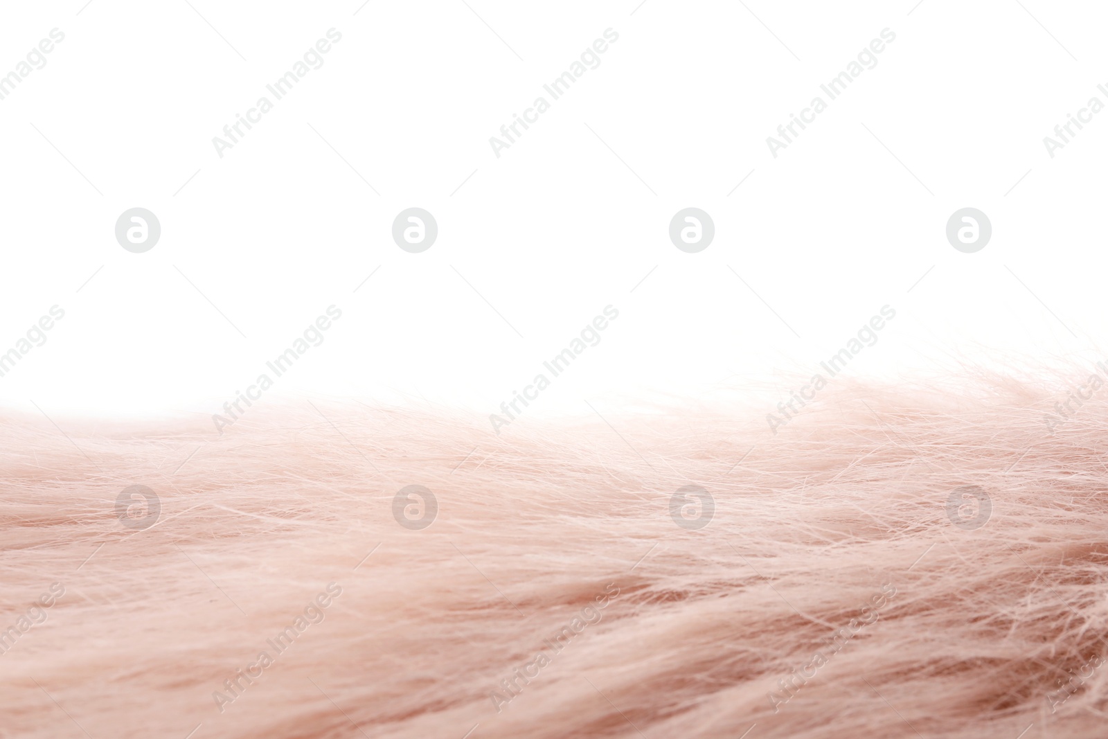 Photo of Soft pink faux fur isolated on white