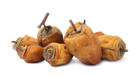 Tasty dried persimmon fruits on white background