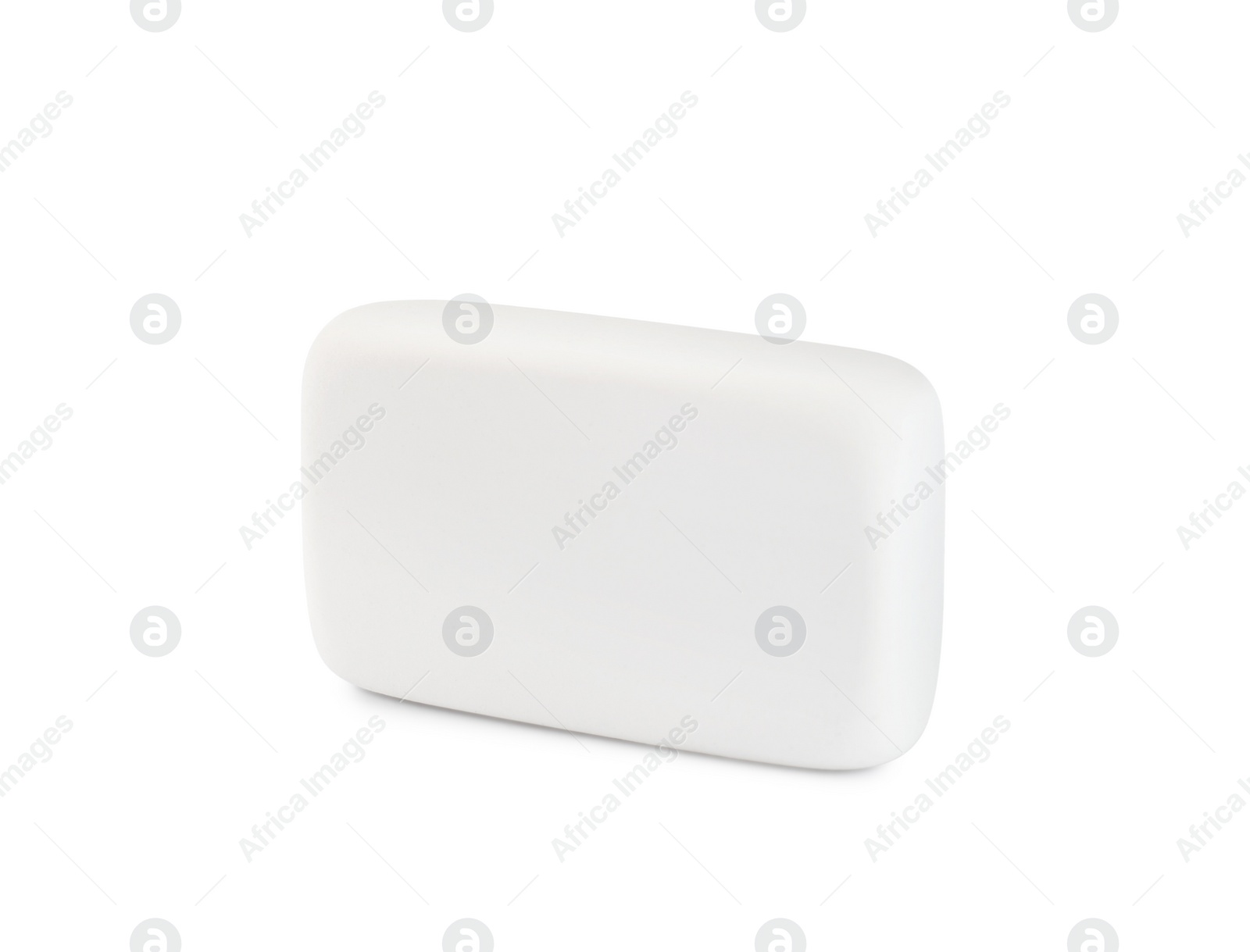 Photo of New eraser isolated on white. School stationery