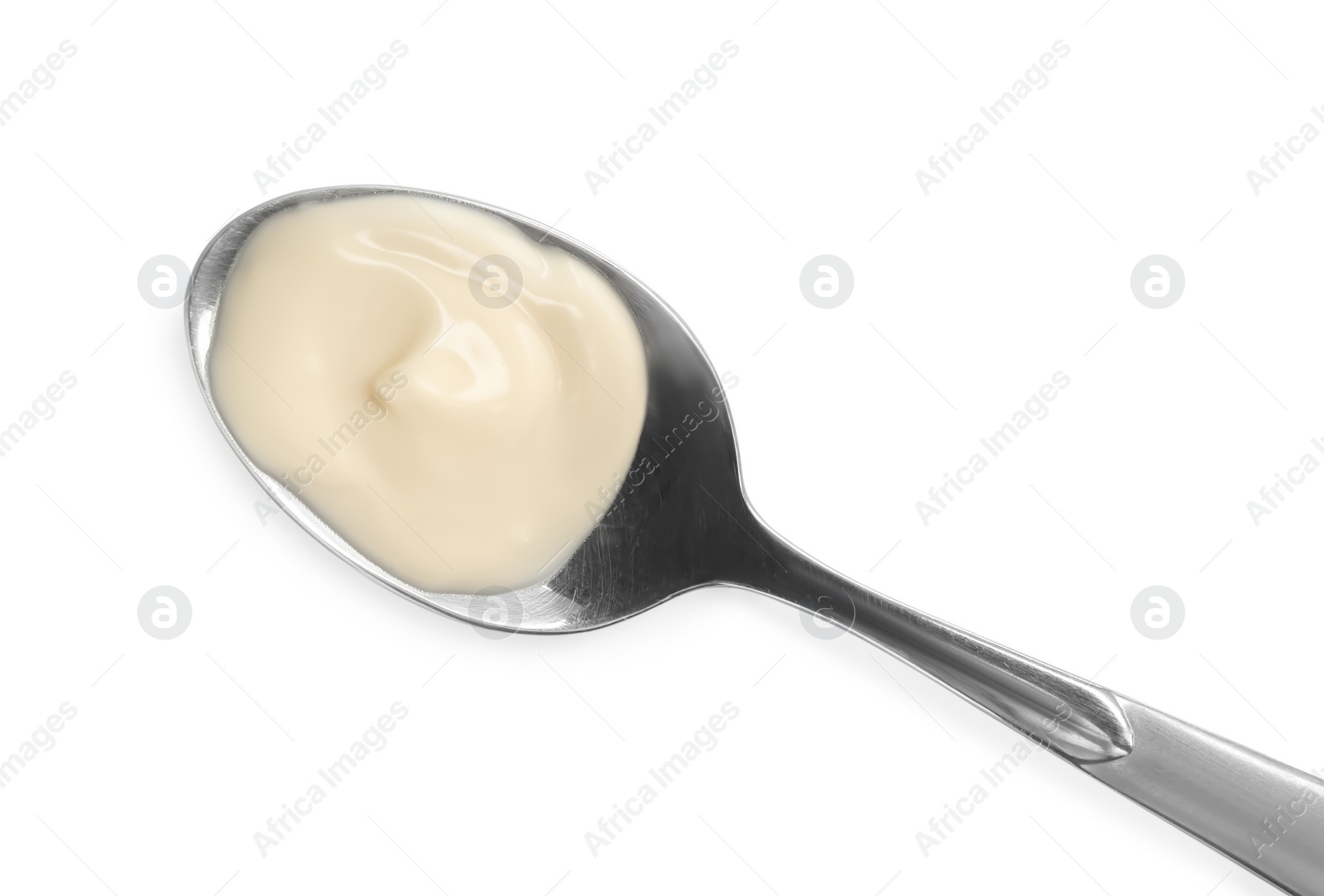 Photo of Metal spoon with mayonnaise isolated on white, top view