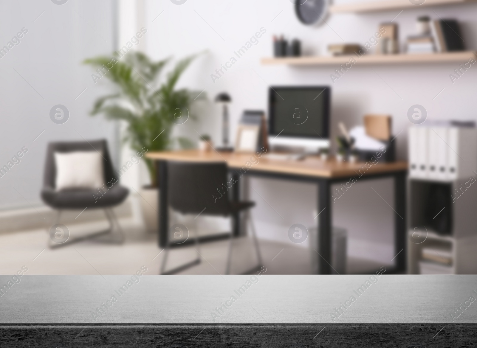 Image of Empty stone surface and blurred view of modern office interior, closeup. Space for text 