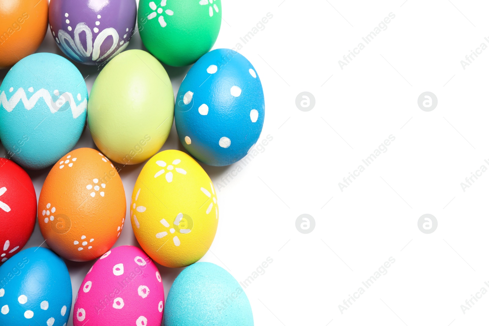 Photo of Colorful Easter eggs with different patterns isolated on white, top view