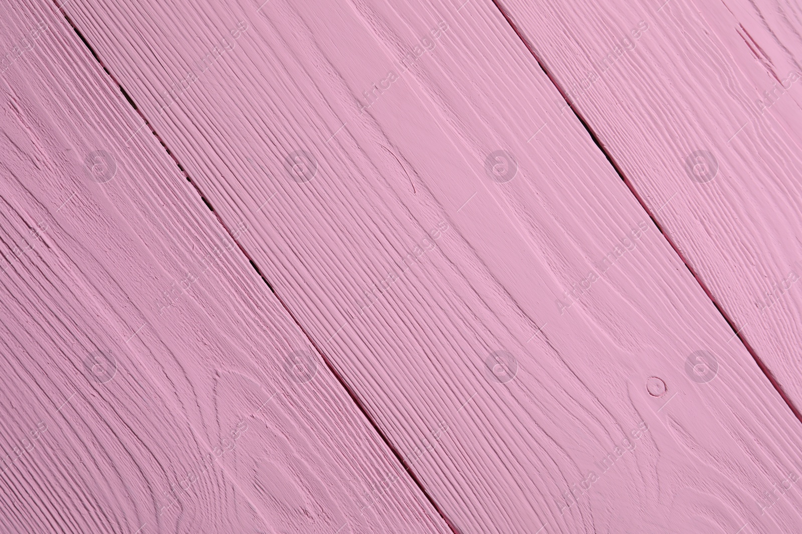 Photo of Texture of pink wooden surface as background, closeup