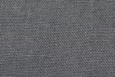 Photo of Texture of grey fabric as background, top view