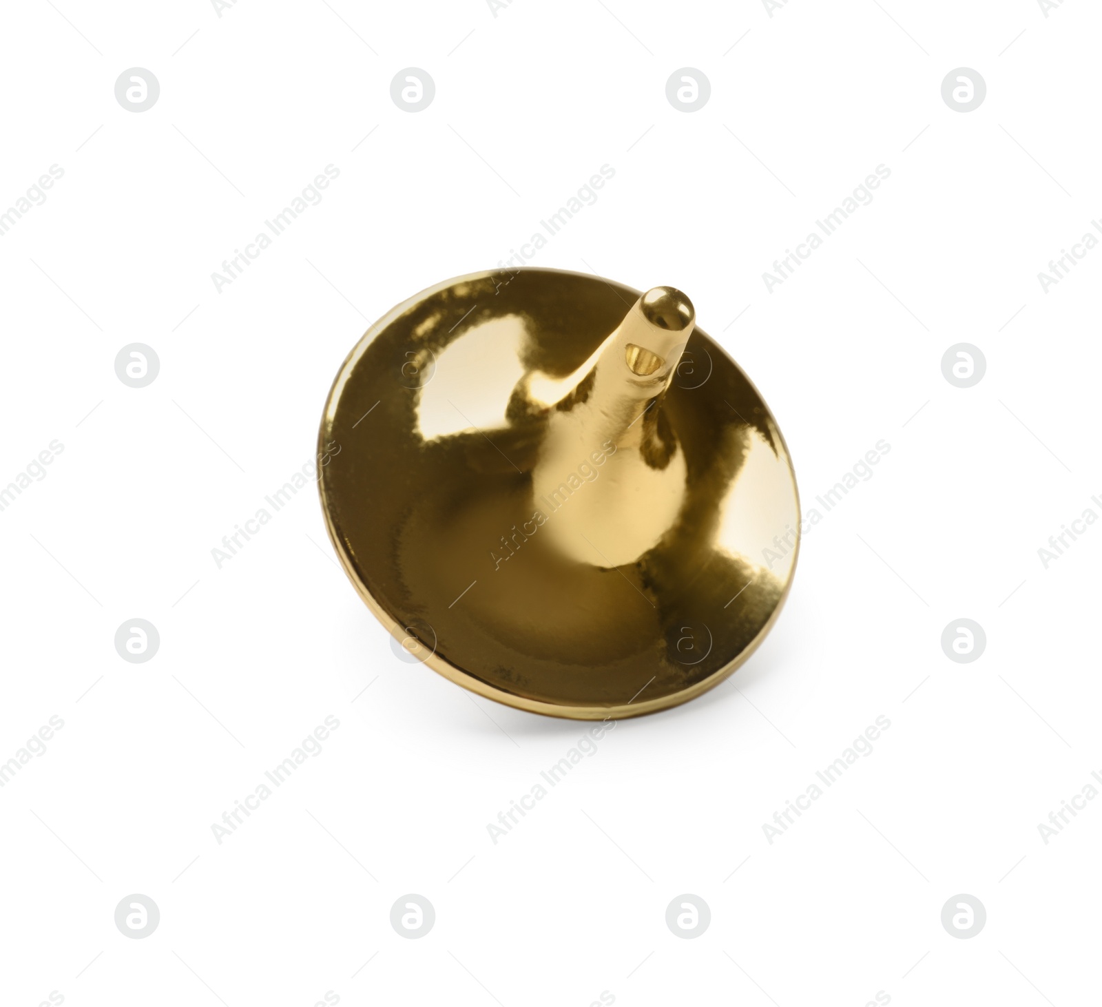 Photo of One golden spinning top on white background