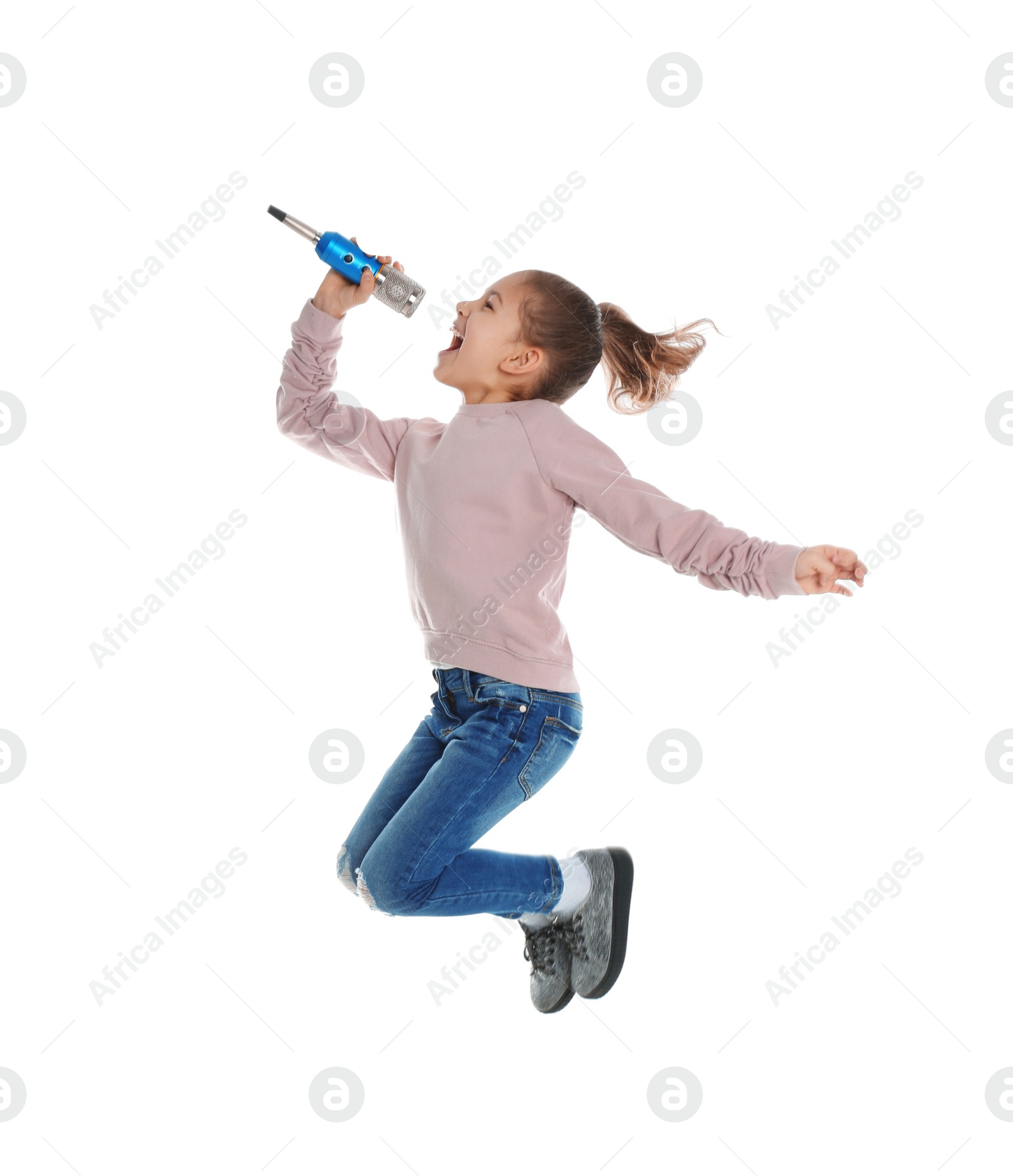 Photo of Cute funny girl with microphone on white background