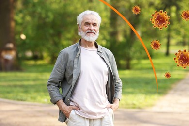 Image of Man with strong immunity surrounded by viruses outdoors