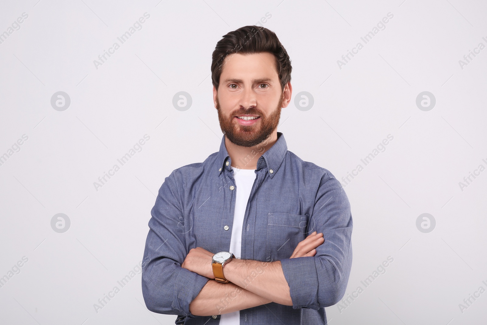 Photo of Portrait of handsome man on white background