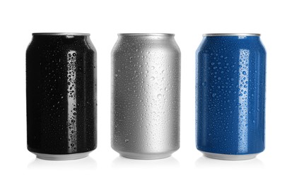 Aluminum cans with water drops on white background. Mockup for design