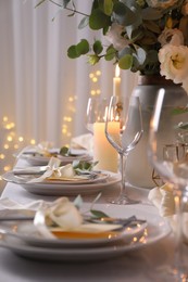 Festive table setting with beautiful decor indoors